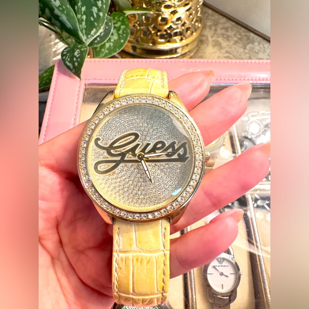 Guess watch/ no box/ needs battery/ patina and leather wear
